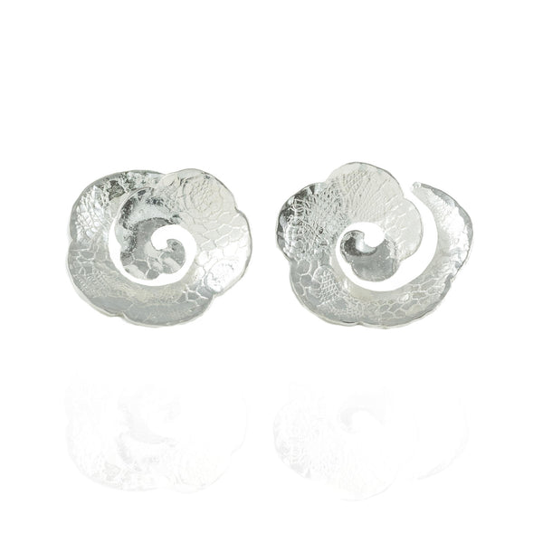 Rosette Studs behind the ear